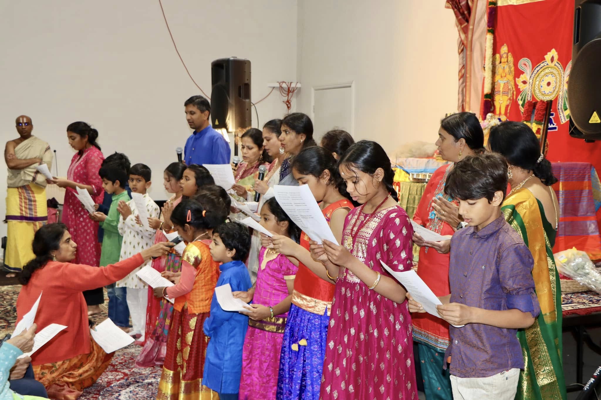 Prajna parents and children singing bhajans together at a Saturday meet